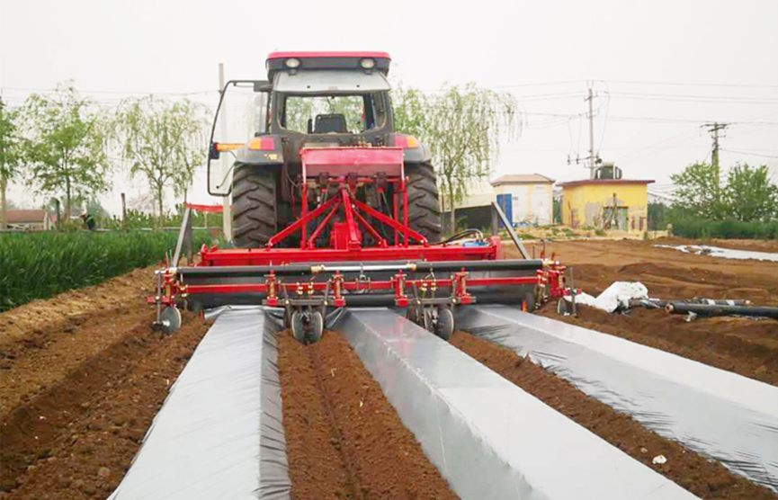 tractor mounted plastic mulch layer bed former machine