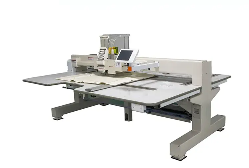 High-speed embroidery machines with glass table